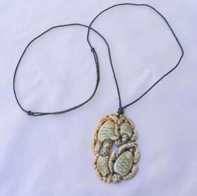 Carved Bone "SeaTurtles" Pendant